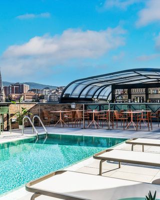 Hugging the estuary in the Basque Country’s de facto capital, Axel Bilbao is a stylish base for exploring the city’s cultural treasures and queer nightlife scene. After a day of pintxo hunting and gallery hopping, the hotel’s rooftop pool offers a refreshing (and flirty) respite.
.
Link in bio

@axelhotels @visiteuskadi