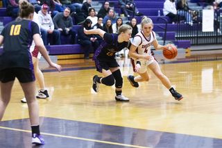 Photos of a girls basketball game between Waterville-Mansfield and Pateros in a 1B District V Championship Friday night at Wenatchee High School. Waterville-Mansfield won the game 58-51. Waterville-Mansfield's Delainey Nelson (4) had a 33-point game. Both teams advance to State playoffs with the first rounds beginning on Tuesday. For more photos visit wenatcheeworld.com.📷 by Jacob Ford/Wenatchee World