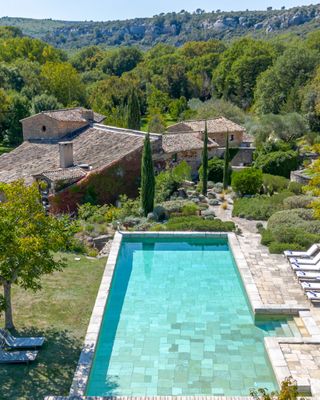 Domaine des Saisons | 33-Hectare Private Estate Between Bonnieux & Lourmarin 🌲🏞️
📍 Bonnieux · Near Lourmarin · Luberon · Provence
Sleeps 15 · 7 Bedrooms · 6 Bathrooms

A true hidden gem in the heart of the Luberon, offering a rare blend of timeless charm, natural beauty, and complete seclusion. Set on over 33 hectares of private land—forests, meadows, olive groves, and a winding river—this extraordinary estate guarantees a level of privacy and tranquility that is nearly impossible to find. No neighbors. No roads. Just nature, silence, and space.

🏛️ 18th-century bastide, private hamlet
Spanning approximately 580 square meters, the property centers around a beautifully restored 18th-century bastide, complemented by several stone outbuildings that form a private hamlet. Spacious interiors blend authentic Provençal character with understated elegance—cathedral ceilings, stone walls, exposed beams, and noble materials throughout. Seven air-conditioned bedrooms spread across the main house and guest annexes comfortably welcome up to 12 adults and a total of 15 guests in complete privacy.

🌳 Large pool, tennis court, endless landscape
Outdoors, enjoy long summer days by the 20x7-meter stone-built pool, a private tennis court, shaded terraces, and multiple al fresco dining spaces. Whether relaxing with family or hosting close friends, this is the ultimate "nowhere but here" retreat—an exclusive escape into the soul of Provence.

🍷 Just a short drive from Bonnieux
All this seclusion, yet just moments from the iconic hilltop village of Bonnieux with its charming cafés, weekly market, and sweeping views over the valley.

Ideal for those seeking absolute privacy, natural beauty, and a truly extraordinary Provençal escape.

Start planning your holiday in Provence with a free consultation with one of our Villa Rental Specialists:
https://my.onlyprovence.com/s/property?name=SAISONS

Weekly rates starting from €17,600.