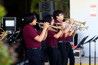 The 1st Bank Yuma parking lot filled with smooth jazz on Saturday afternoon, a remarkably busy day for Nogales-area community events. The Charles Mingus Hometown Jazz Festival honored the Nogales-born jazz legend with a quintet of bands from noon to 5 p.m.

The performers included Rio Rico High School and Nogales High School jazz bands as well as an NHS alumni band. Among the audience was Congresswoman Adelita Grijalva, in Nogales for a community forum that morning.

The Mingus Festival has kept Nogales' jazz tradition strong for over 30 years and running.

Photos by @grhmkrwnghs