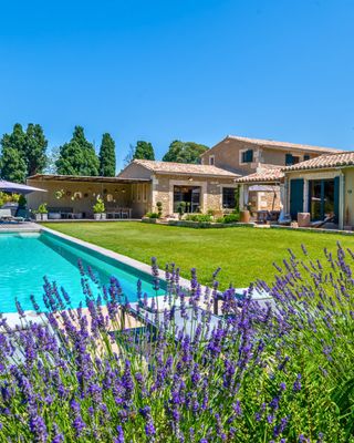 A truly lovely renovation respecting heritage and stone in the Saint-Rémy countryside — your refined escape at Mas Mozart. 🏛️✨
📍 Saint-Rémy-de-Provence · Alpilles · Provence

This luxury 290-square-meter farmhouse sleeps eight across four air-conditioned ensuite bedrooms. Natural stone floors and wooden ceilings meet beautiful finishings and modern amenities. A large open kitchen and dining area flows to the living room, with one bedroom on the ground floor and three upstairs.

The interior flows easily onto covered and uncovered terraces for relaxing in the sun or dining outdoors. A 15-meter heated pool is ideal for swimming laps or children's play. Nearby, an air-conditioned pool house with full bathroom and kitchen features a treehouse-style loft above. A boules court near a shade tree invites friendly competitions.

Come enjoy the splendor of the Provençal countryside in a refined and elegant stone farmhouse near the best villages in the Alpilles.

Contact one of our Villa Rental Specialists to check availability:
https://my.onlyprovence.com/s/property?name=MOZART

Weekly rates starting from €6,350.