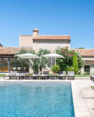 ⭐ New to the Collection: Wood-fired pizzas on summer evenings and open views to the Alpilles hills at Mas de la Poésie, a beautifully restored luxury farmhouse strolling distance from Eygalières. 🍕🌳
📍 Eygalières · Alpilles · Provence

This elegant villa sleeps 10 across six beautifully appointed bedroom suites, blending authentic character with modern luxury. Natural materials, carefully selected furnishings, and thoughtful amenities create a warm, welcoming atmosphere, while air-conditioning, high-speed internet, a fully equipped fitness room, and premium entertainment systems ensure comfort in every season. At the heart of the property, the spacious kitchen and dining area open onto shaded terraces and sun-drenched gardens for long lunches and convivial evenings.

Set behind a gated entrance amid landscaped gardens, the outdoor spaces invite lazy days beside the large pool, a game of pétanque, or unwinding beneath mature trees. Within a fifteen-minute walk of Eygalières and its Michelin-starred restaurants, artisan shops, lively cafés, and weekly market, with Saint-Rémy-de-Provence, Les Baux-de-Provence, and Maussane all within easy reach.

Contact one of our Villa Rental Specialists to check availability:
https://my.onlyprovence.com/s/property?name=POESIE

Weekly rates starting from €9,425.