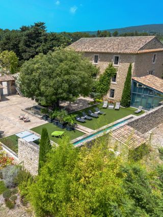 Step into a private oasis at Bastide de la Senancole, a splendidly renovated luxury villa set among olive groves on the outskirts of Gordes. 🫒🎹
📍 Cabrières-d'Avignon · Luberon · Provence

This large stone farmhouse sleeps 12 across six unique, spacious ensuite bedrooms over three levels, each air-conditioned for summer comfort and ideal for couples traveling together. The understated contemporary design flows beautifully with the home's authentic character. Vast interior spaces include a large dining area open to the semi-professional kitchen, and a large salon with a fireplace, television, and a Bechstein piano, framed by open windows facing the courtyard.

Manicured grounds welcome you with an open courtyard looking to the hills, comfortable shaded seating for morning coffees, afternoon naps, or evening cocktails, and a large basin pool offering a mix of sun and shade. Evenings in the courtyard are special, with beautiful lights highlighting the natural stone, trees, and sculptures. A moment's drive from the famous sights and villages of the Luberon.

Contact one of our Villa Rental Specialists to check availability at the link in our bio.

Weekly rates starting from €7,350.
