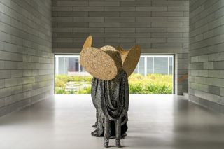 Nick Cave's newest commission, "Louder Still," 2025, is now on view in Room 1 of Glenstone Museum's Pavilions building in Potomac, Maryland.

The installation is the artist's largest multi-figure Soundsuit to date, uniting eleven discrete forms beneath a single, monolithic textile hand-sewn with iridescent mother-of-pearl buttons. The oversized headpieces, shaped like gramophones and tuba horns, evoke music and the sounds of protest — themes Cave considers central to the work.

Learn more at the link in bio.

📸: Courtesy of Glenstone Museum.

#NickCave #GlenstoneMuseum #JackShainmanGallery #JSG #JSGArtist