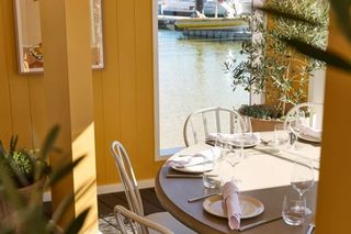 The best spot to be when enjoying our group dining menu, tucked away in this beautifully-lit, cosy corner with water views either side. Feast your way through a chef's selection of starters, mains, sides and dessert, all made to share. For food lovers of 8 and above.